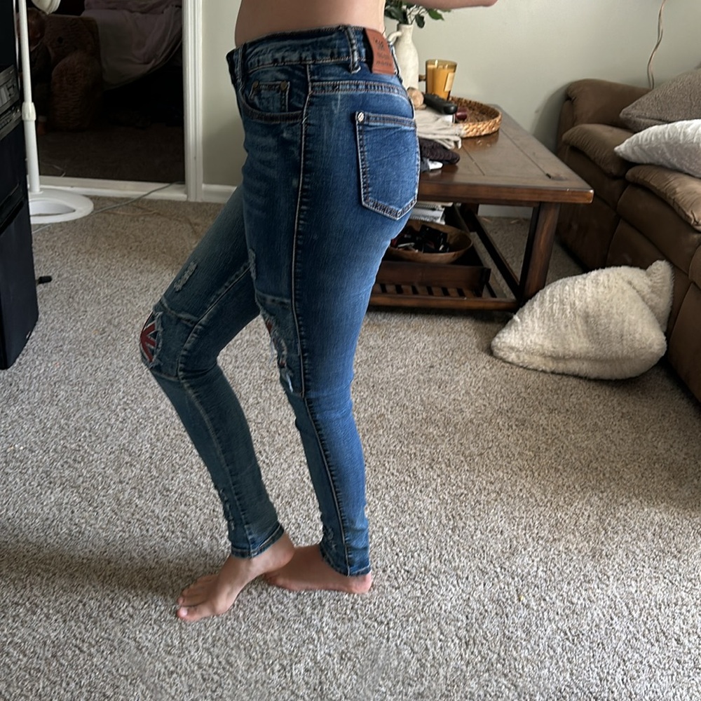 Blue Skinny Jeans with Flag Patch Knee Detail - Picture 2 of 8